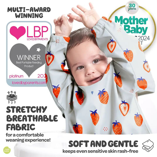 Baby Wearing a Strawberry-Patterned Bib Which is a LovedByParents and Mother & Baby Award Winner