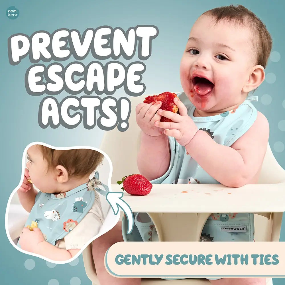 Baby Messily Eating, Wearing a Dinos Baby Bib in Light Green. Prevent Escape Acts! Gently Secure with Ties.